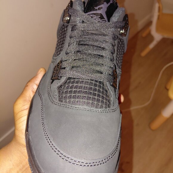 Black cat jordan 4
